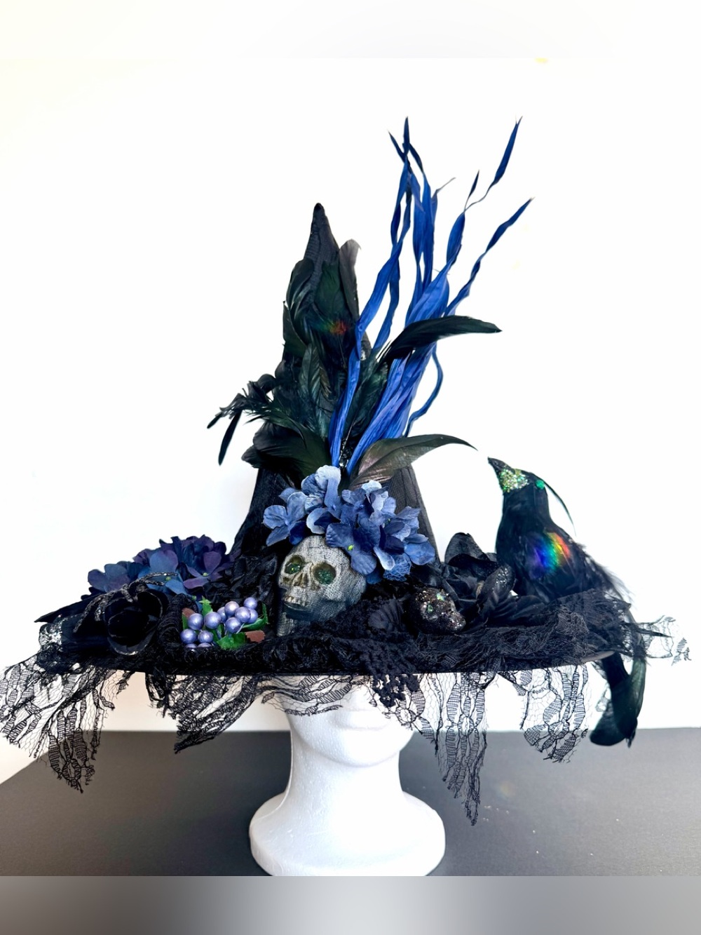 Which hat Victorian one of artisan, black trimmed in blue adult one size